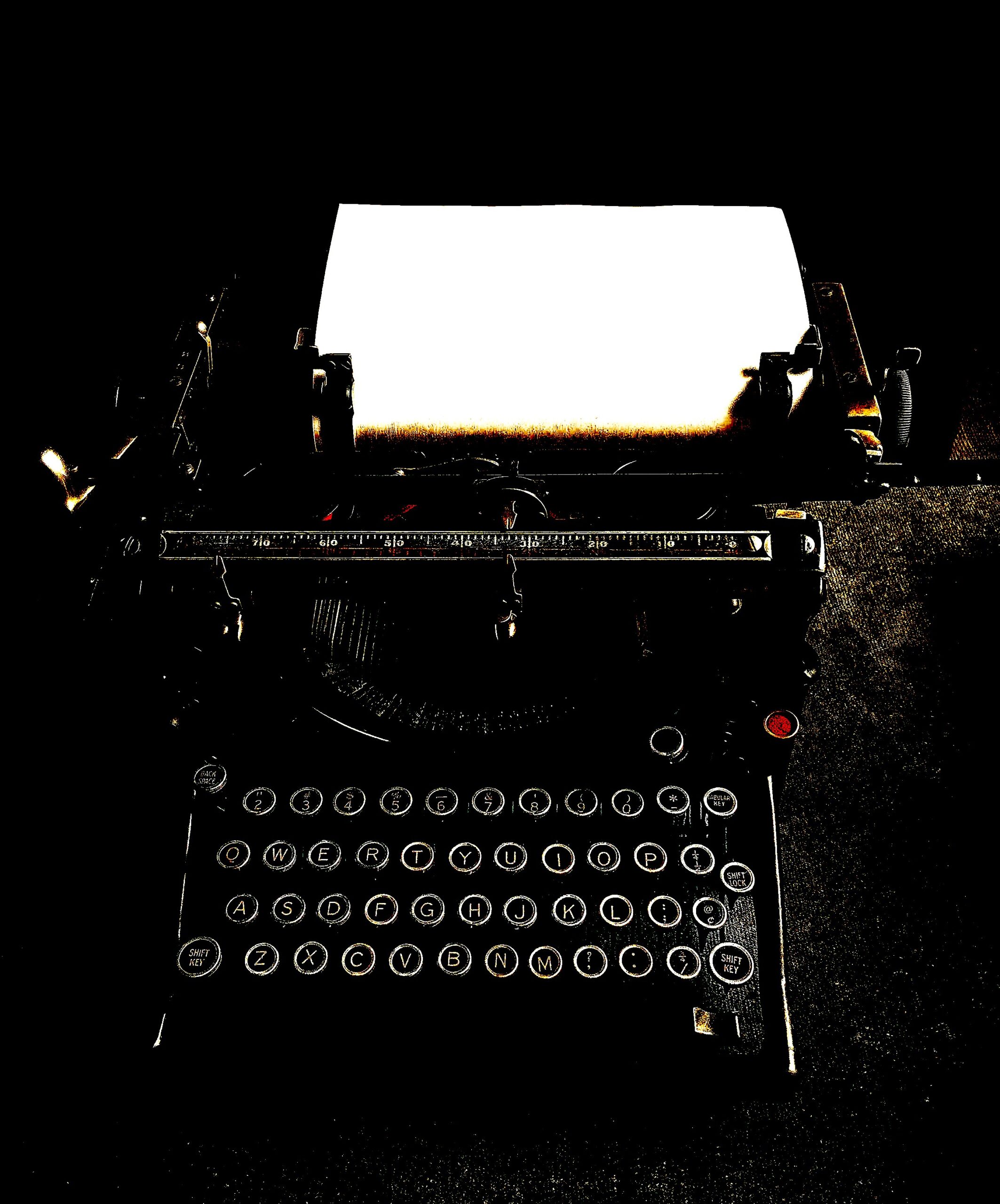 A creepy old typewriter whit a blank white page, also known as every writer's fear.